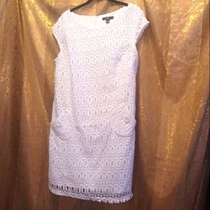 Size 14. Ladies fully lined white lace dress. R&K brand. Excellent condition.